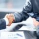 Baisse des valorisations dans la transmission des PME en Suisse romande : enjeux et stratégies - business - réunion dirigeants business