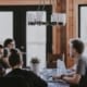 Céder une franchise en Suisse romande : guide pratique - business - réunion dirigeants business