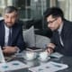Baisse des valorisations dans la transmission des PME en Suisse romande : enjeux et stratégies - business - réunion dirigeants business